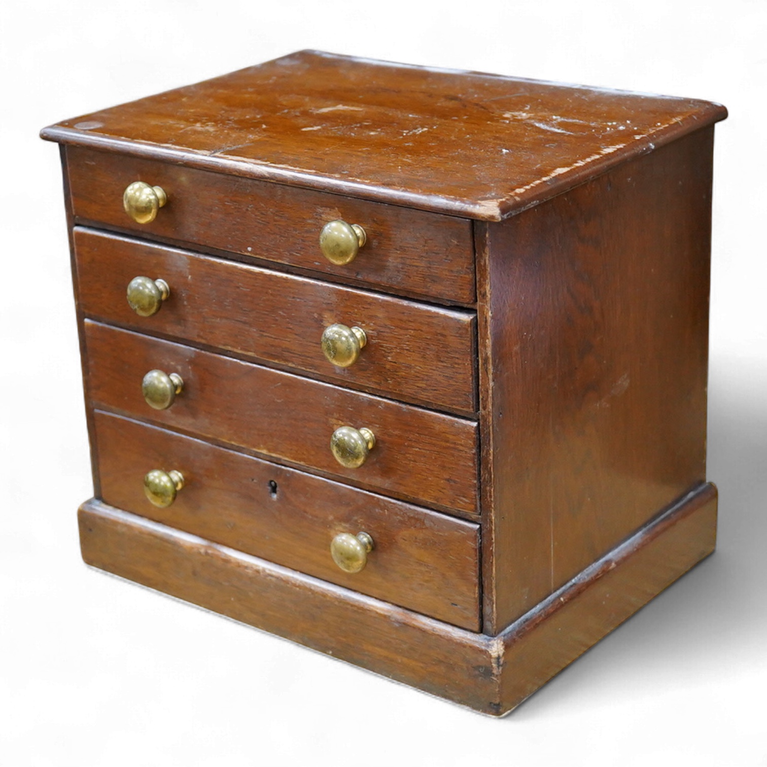 A 19th century mahogany tabletop chest of four drawers, 24cm high